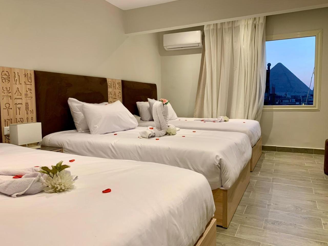 Khufu Pyramids Inn Nazlet el-Sîsi Extérieur photo